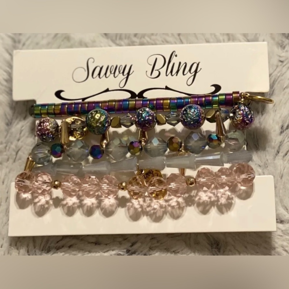 Savvy Bling Bracelet Stack.(Total of 5 in stack)One size fits most.Multi colored